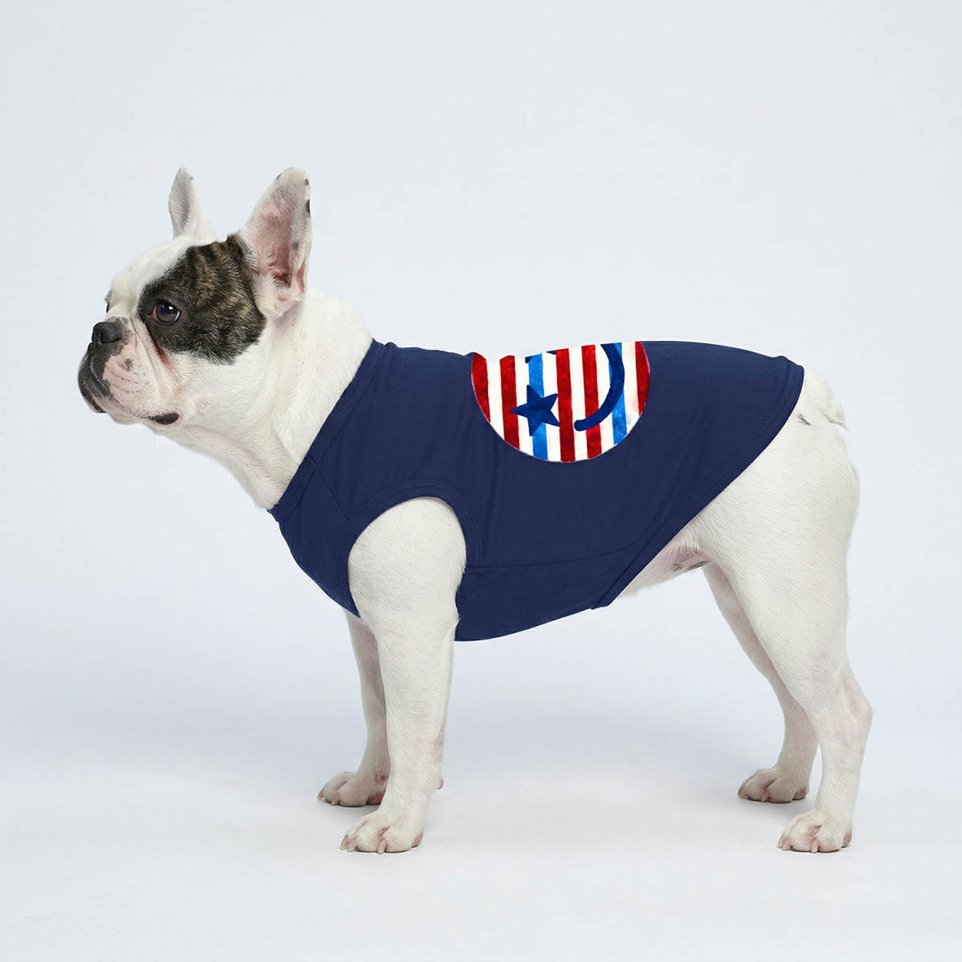 French Bulldog wearing patriotic dog tank top in a white background