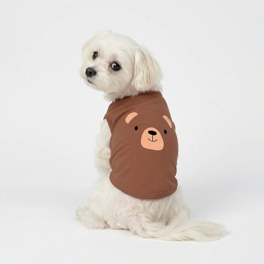 Back view of a Maltese in a brown bear prints dog tank top