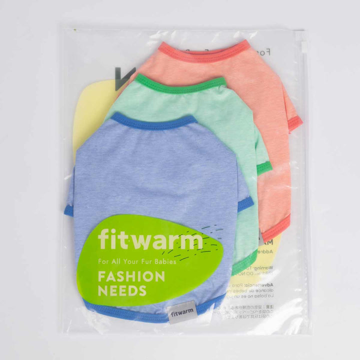 Packaged dog shirt set with three pastel colors: blue, peach, and green in a sealed bag with Fitwarm branding.