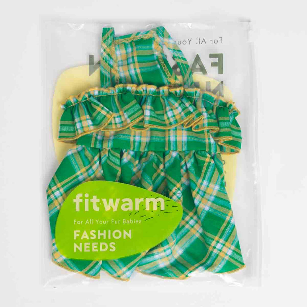 Green and yellow plaid dog dress in packaging with 'fitwarm' label.