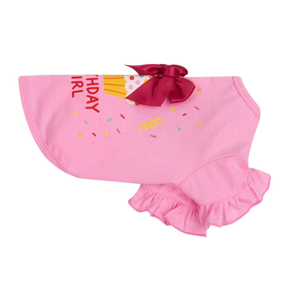 Side view of birthday shirt for dogs with bow, cake, confetti and 'birthday girl' lettering