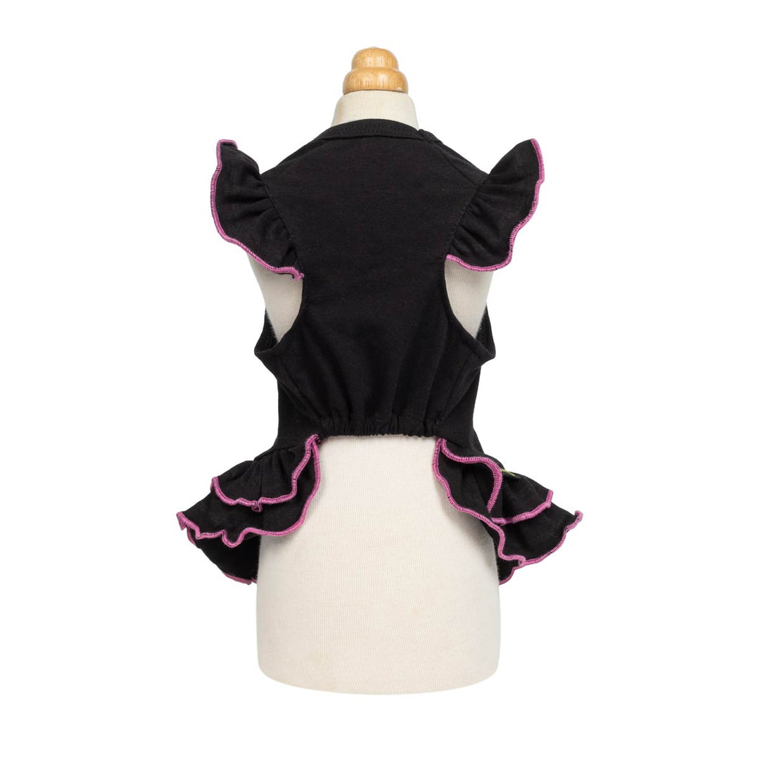Black dog tutu design with charming ruffled sleeves and skirt showing on a white background