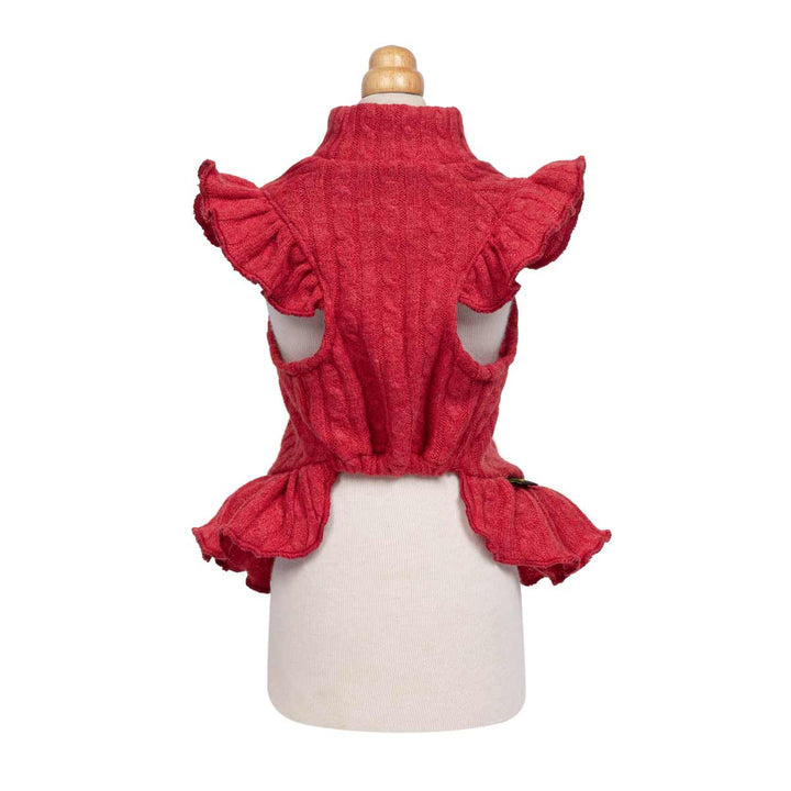 Red textured knit dress for dogs with ruffled shoulder details and a mock neck, displayed on a cream-colored mannequin torso against a white background