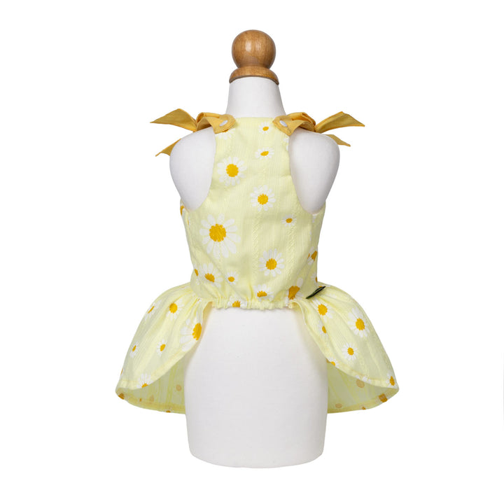 Yellow daisy summer dog dresses on a mannequin with a white background