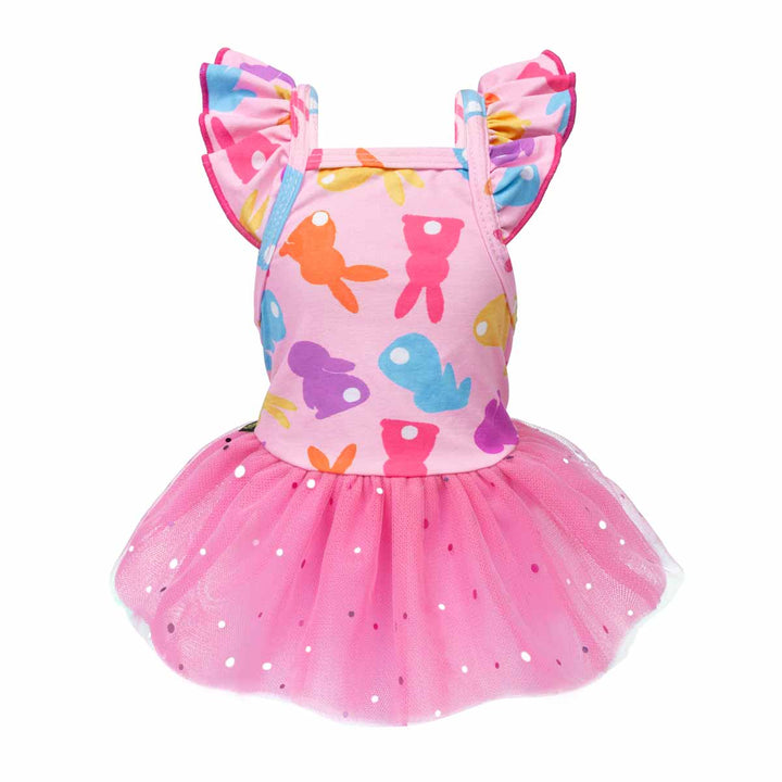 Dog dress in packaging, featuring a pink base with colorful bunny designs and a tutu skirt.
