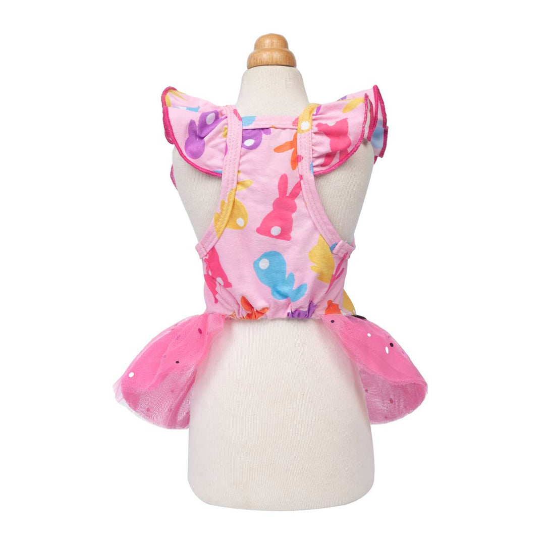 Back view of a pink dog dress with bunny prints and a fluffy tutu, showing a cute design.