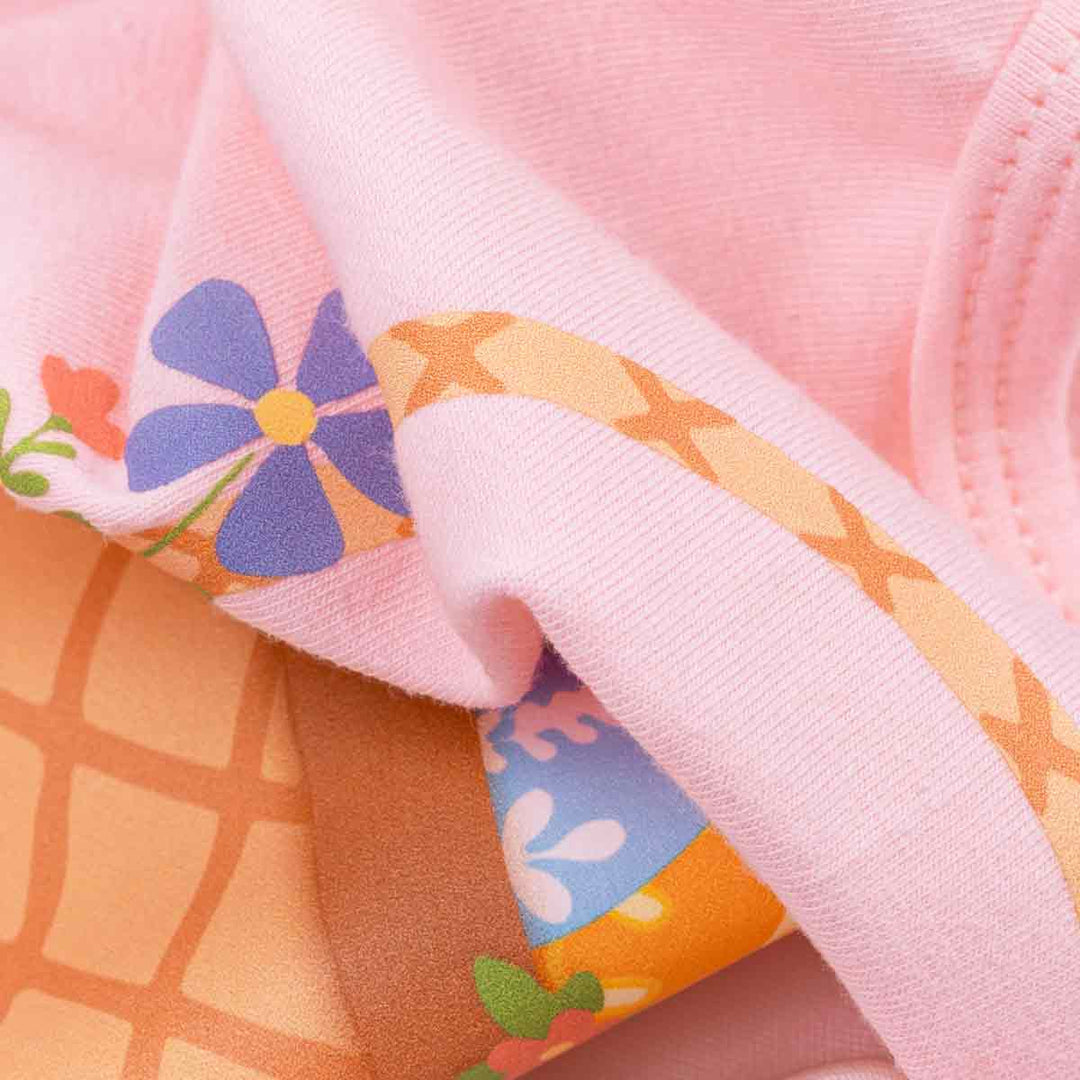 Close up cotton blend dog shirt fabric with pastel Easter print