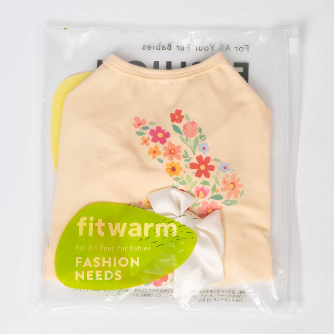 Dog shirt in Fitwarm pouch packaging with floral bunny print and white bow