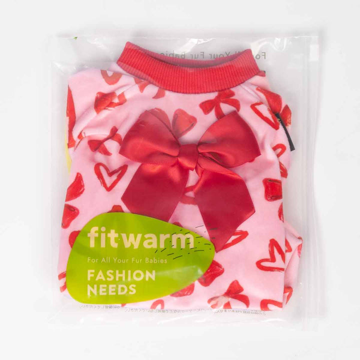 Packaged heart and bow print dog pajamas with satin bow in a clear bag
