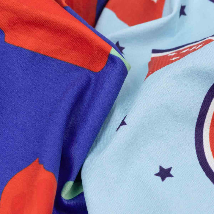 Close-up of colorful fabric with ice pop patterns and star designs