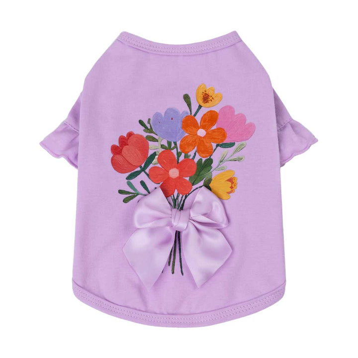 Front view of purple floral dog shirt with bow detail designed for dogs