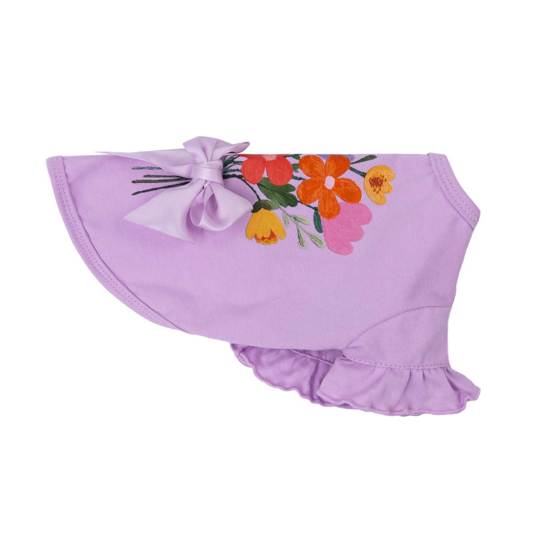 Flat side view of purple dog shirt featuring floral bouquet print for dogs