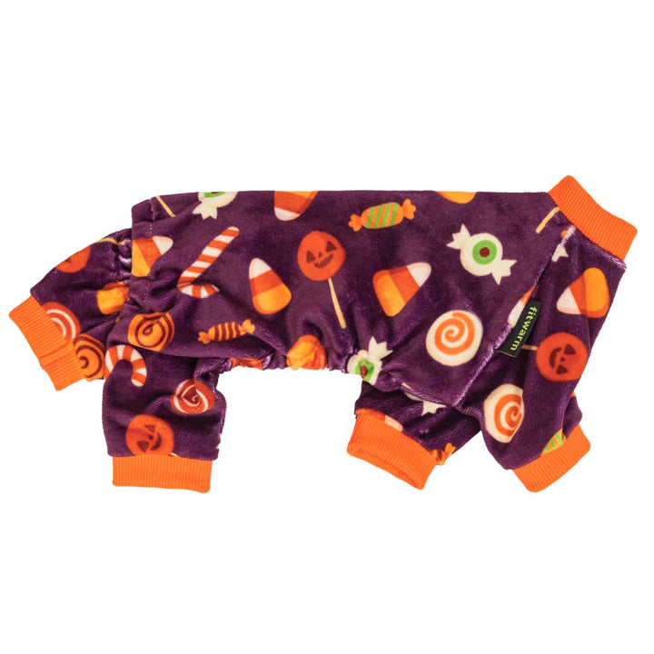 Purple dog Halloween costume, a cozy onesie with candy corn, jack-o'-lanterns, and festive sweet patterns, orange cuffed.