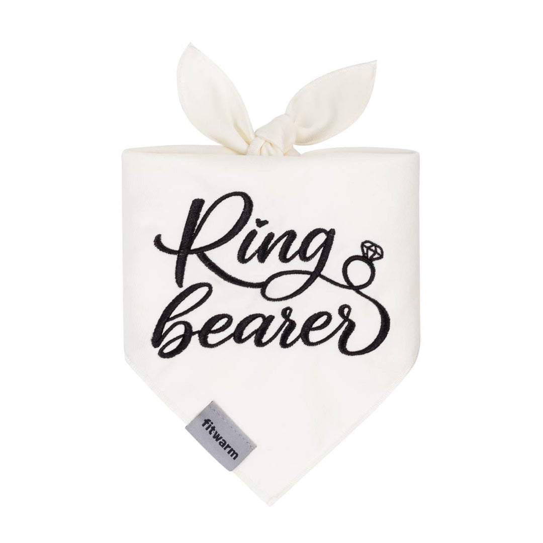 White dog bandanas with black embroidered Ring Bearer lettering tied for wedding dogs