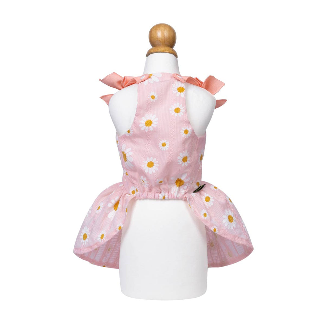 Pink dog summer dresswith floral pattern on a mannequin against a white background