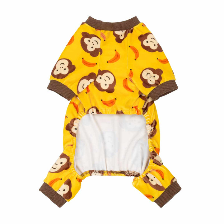 Soft dog onesie in monkey and banana prints in a white background