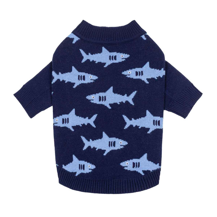 Navy blue knit sweater for dogs with a light blue shark pattern, featuring short sleeves and a ribbed collar, cuffs, and hem, shown against a plain white background