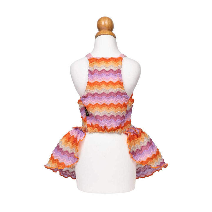 Colorful striped dog summer dress on a mannequin against a white background