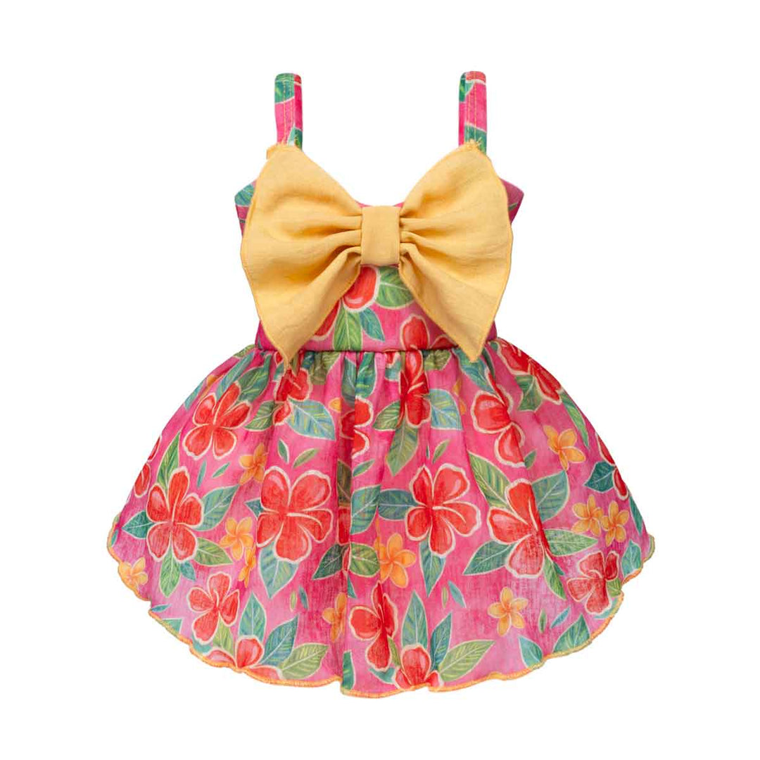 Summer dress for dogs with floral pattern and yellow bow on a white background