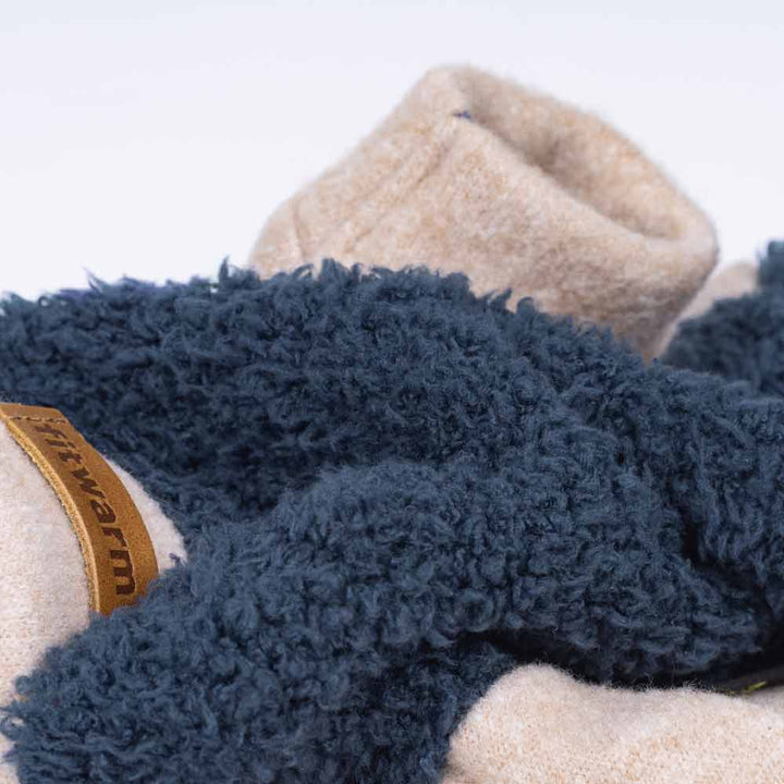 Reversed Dog pajamas in navy fleece highlighting interior thermal lining