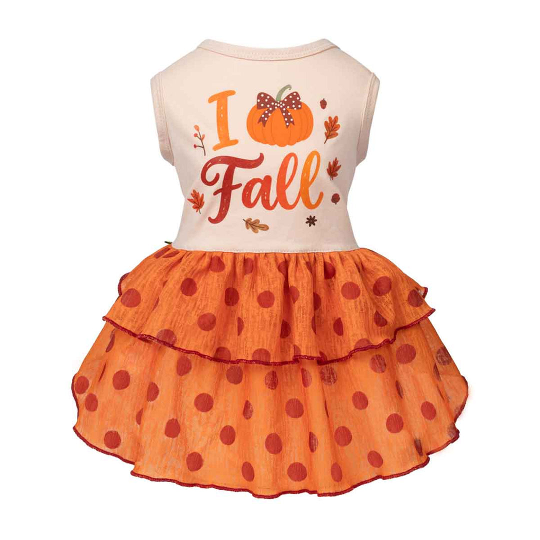 Thanksgiving dog dress featuring a cream-colored top with a 'I Love Fall' autumn graphic and a tiered orange skirt with red polka dots, shown on a plain white background