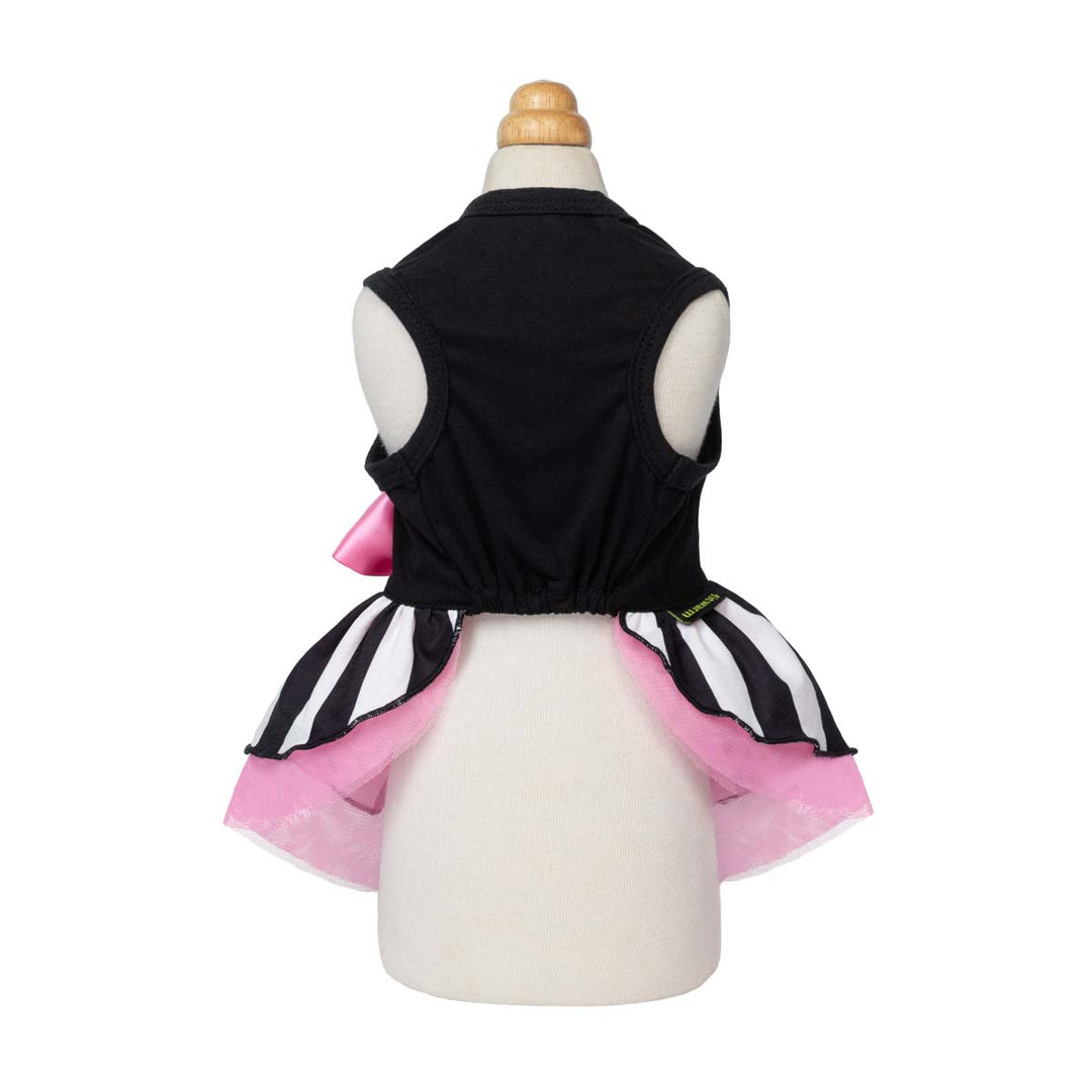 Sleeveless Halloween dog tutu displayed on a cream-colored mannequin torso, showing the back view