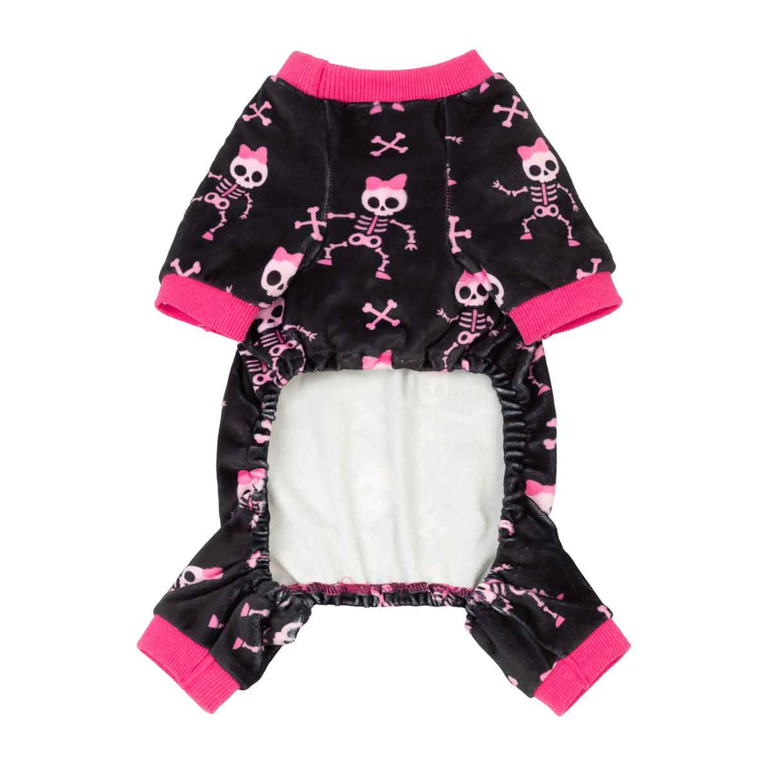 Halloween dog onesie featuring a pink and white skeleton print, with bright pink ribbed cuffs and collar, and a white fleece lining
