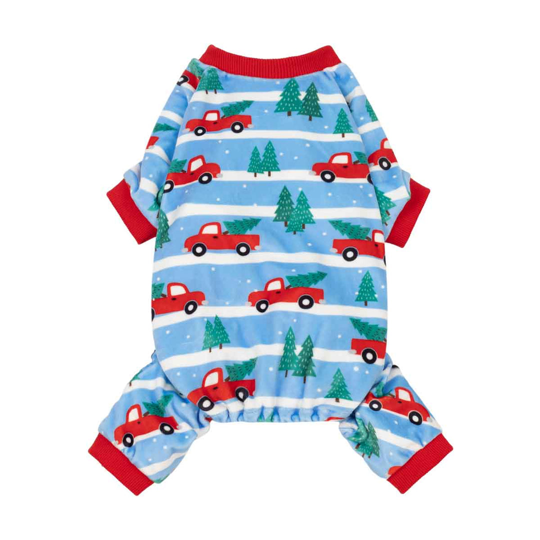 Xmas dog pjs with truck, Christmas tree and snowy path prints on a white background
