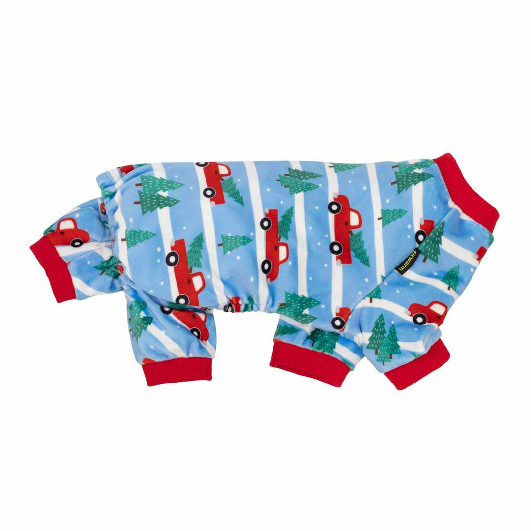 Side view of festive pajamas for dogs designed with truck and tree 