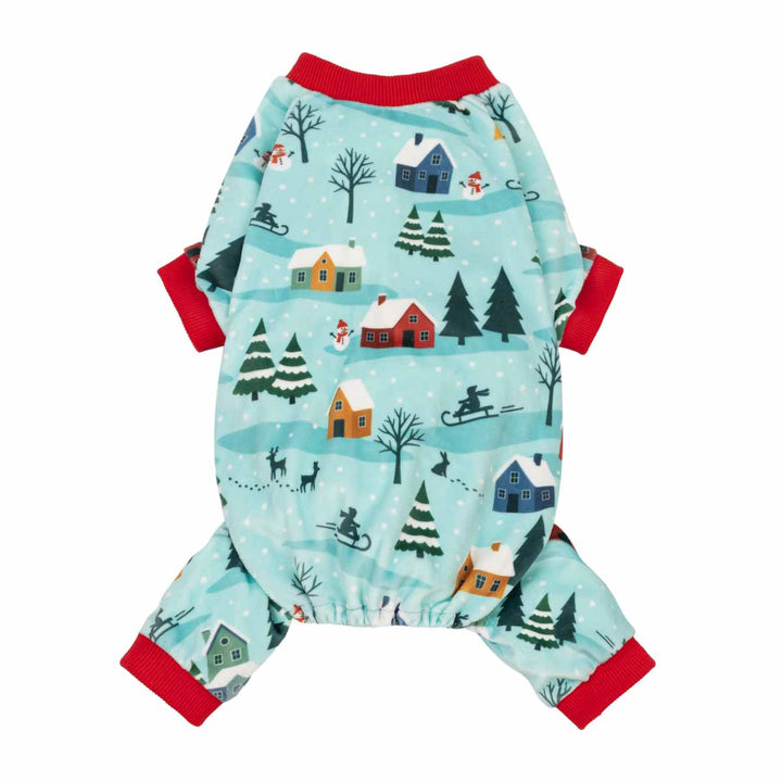 Christmas dog pajama with a winter village print, featuring red trim on the neck, sleeves, and cuffs, shown against a plain white background