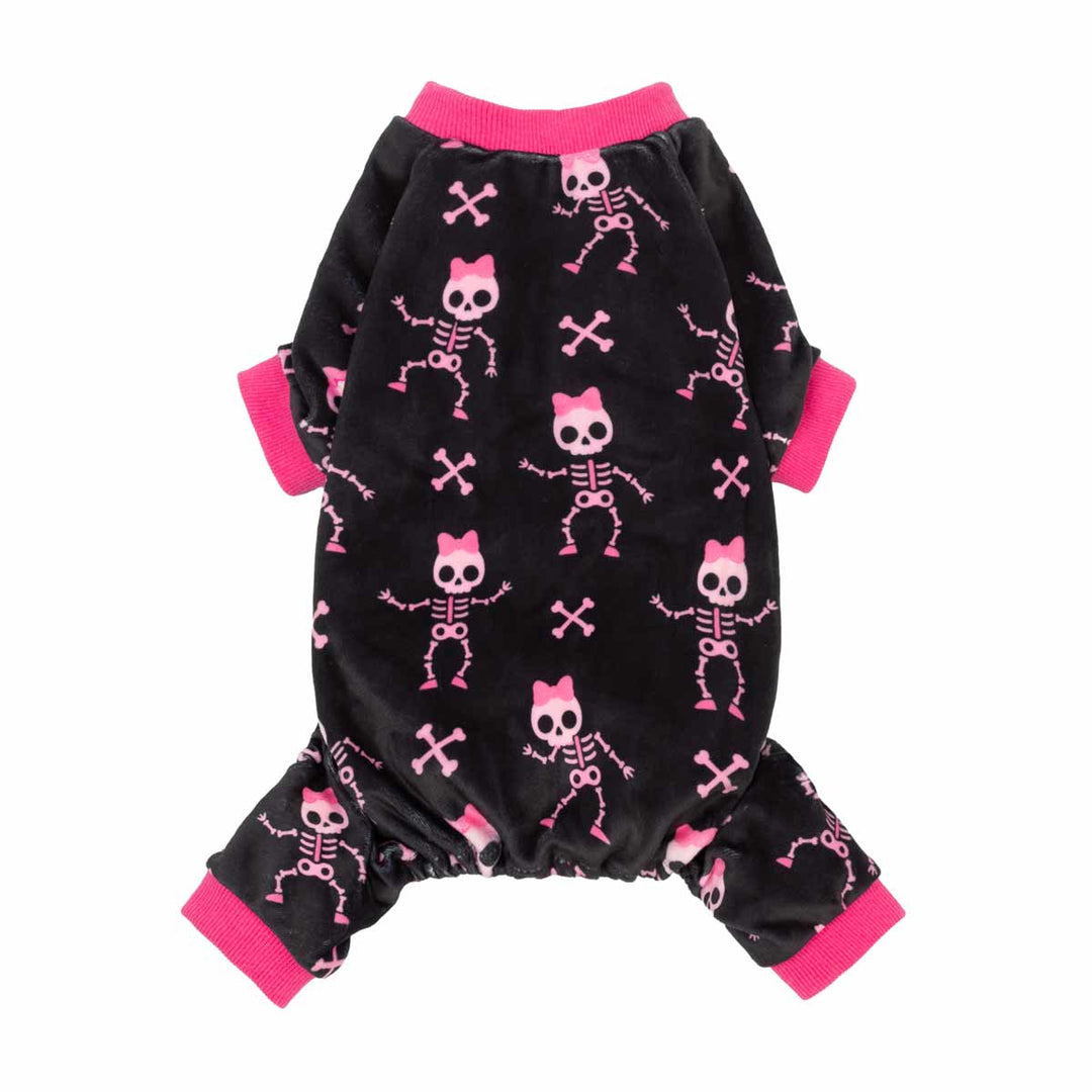 Black dog js with a pink and white skeleton pattern, featuring bright pink ribbed cuffs and collar, shown against a plain white background