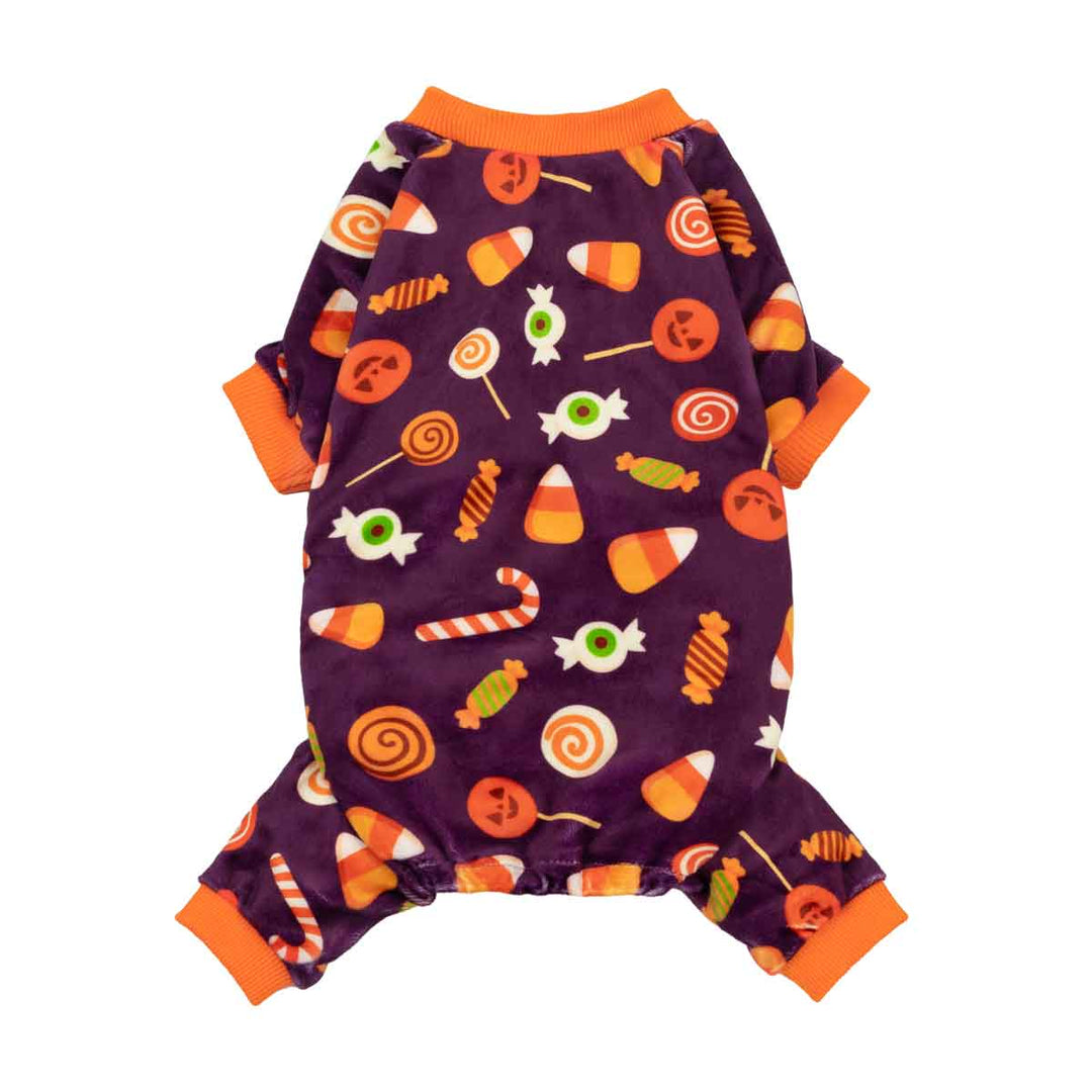 Soft purple Halloween dog pajamas with playful candy corn, jack-o'-lantern, and sweet treat prints; orange cuffs and neck.