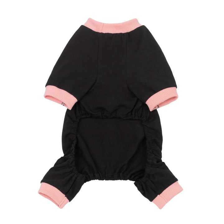 Black pajamas for dogs with light pink ribbed trim on the collar, sleeve cuffs, and leg cuffs, shown flat on a white background