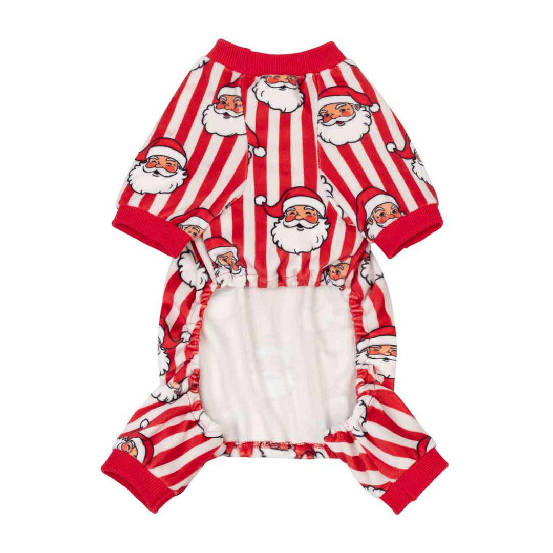 Small dog Christmas onesie featuring a festive red and white striped pattern with Santa Claus faces printed all over it