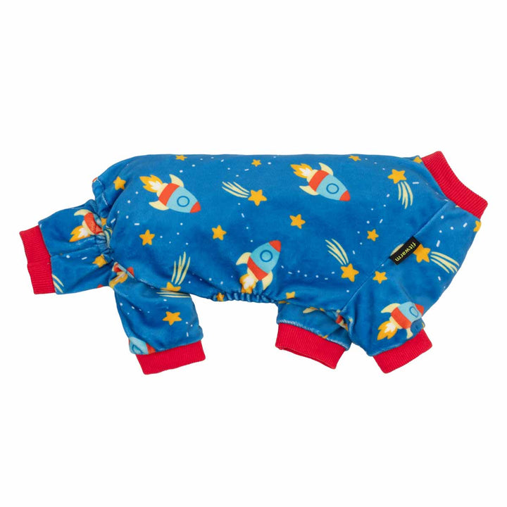 Blue pajama for dogs with a space-themed print of rockets, stars, and meteors, featuring red ribbed cuffs and collar, shown on a plain white background