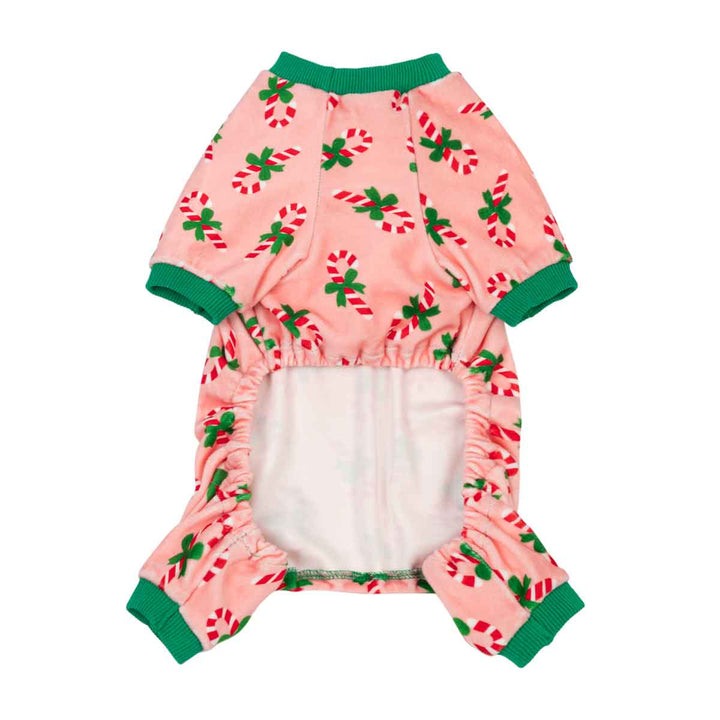 Pink Christmas dog pajamas with candy cane print and green trim. Cozy holiday pet apparel.