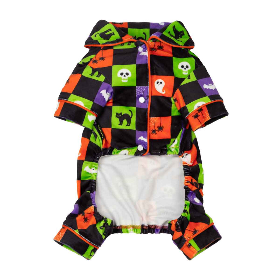 Halloween-themed dog onesie with a colorful patchwork pattern of black, orange, green, and purple squares featuring skulls, ghosts, spiders, and cats, shown on a plain white background