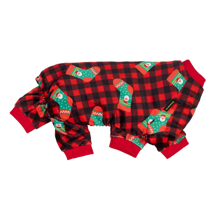 Side view of dog pjs with a red and black plaid pattern, decorated with green Christmas stockings and red ribbed cuffs and leg openings, shown on a plain white background