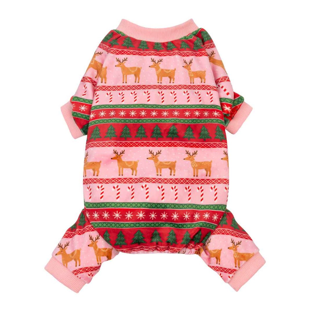 Pink pajamas for dogs with a festive Christmas holiday print featuring reindeer, candy canes, and Christmas trees in red, green, and gold, shown on a plain white background