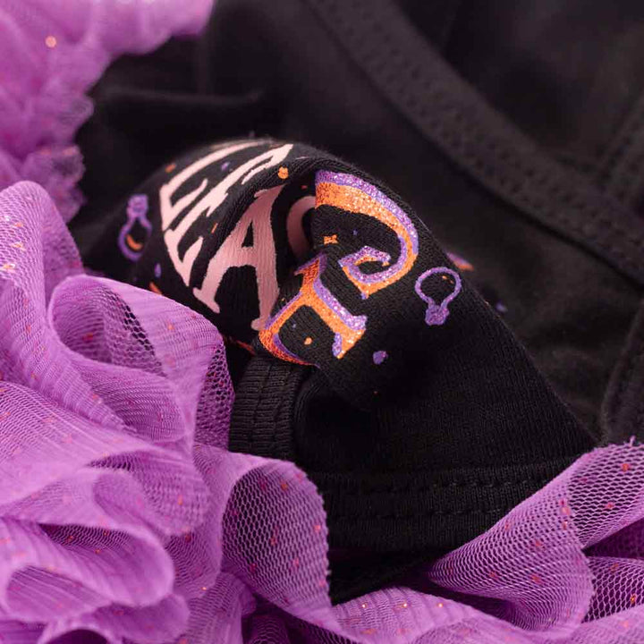 Black dog tutu dress with "WITCH PLEASE" sparkle graphic & layered purple tulle skirt.