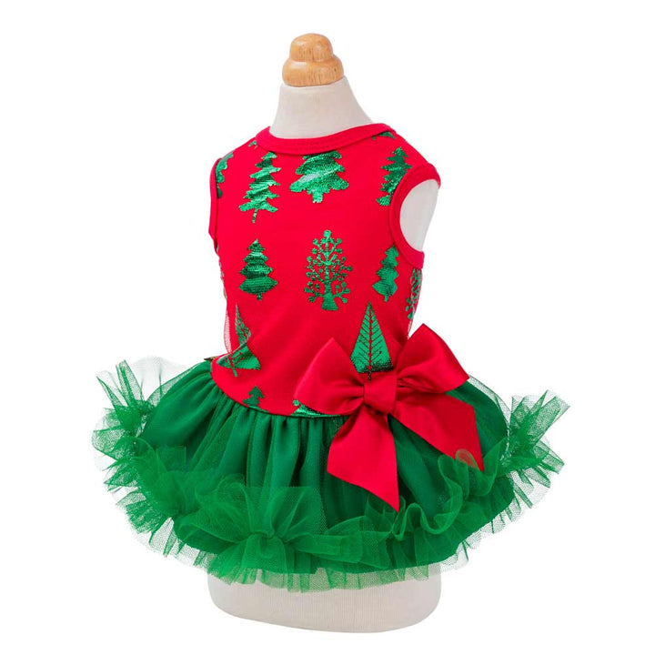 Red Christmas dog dress with green tree print, layered green tulle skirt, and red satin bow for festive photos.