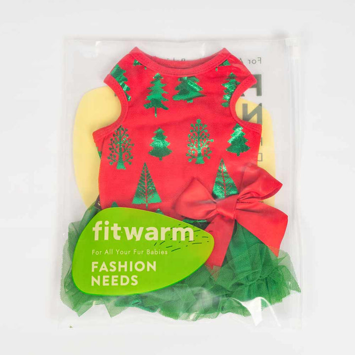 Red dog tutu dress with shimmering green Christmas trees, green tulle skirt, and red bow, packaged for display.
