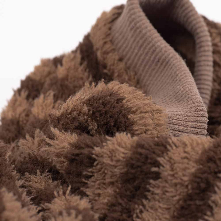 Close-up of brown textured fabric with a ribbed texture
