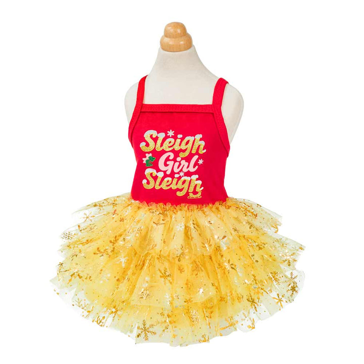 Festive red and gold dog dress featuring glittery tulle skirt and holiday lettering print.