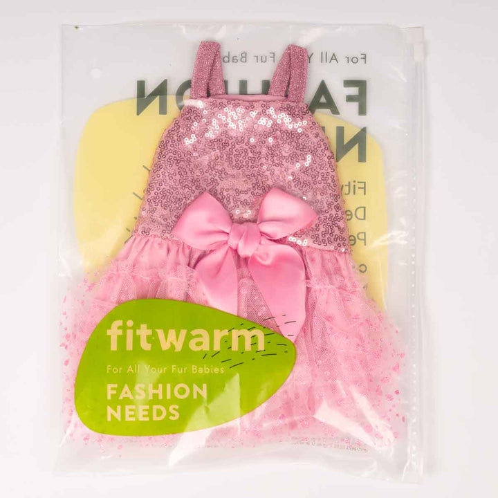 Pink sequined dog dress with a bow in packaging labeled 'fitwarm'.
