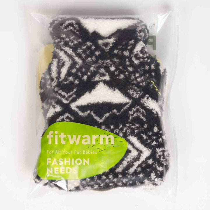 Black and white patterned dog pajamas packaged in a clear Fitwarm-branded bag.
