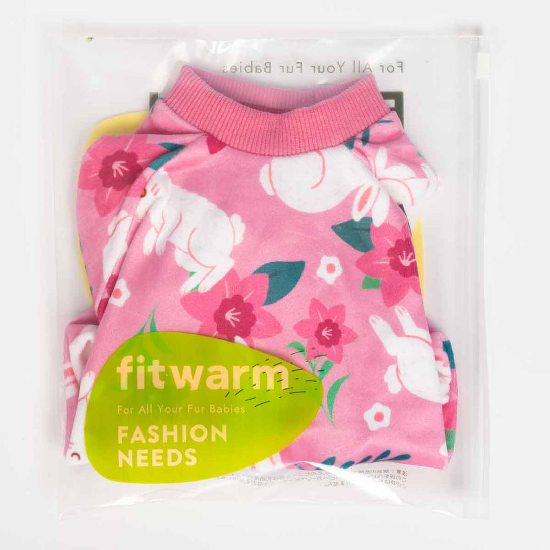 Pink bunny-print dog pajamas neatly packed in a clear Fitwarm branded bag.