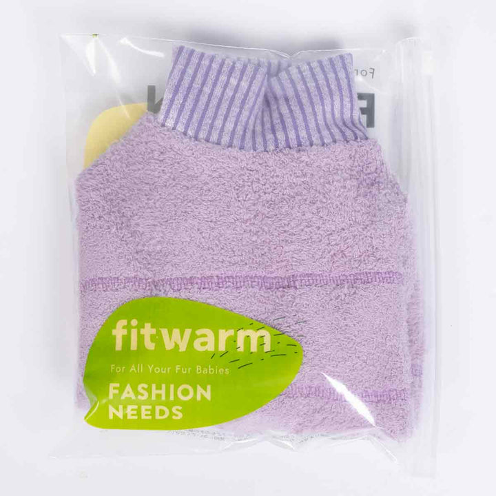 Lilac dog pajamas folded inside Fitwarm packaging with ribbed collar visible.