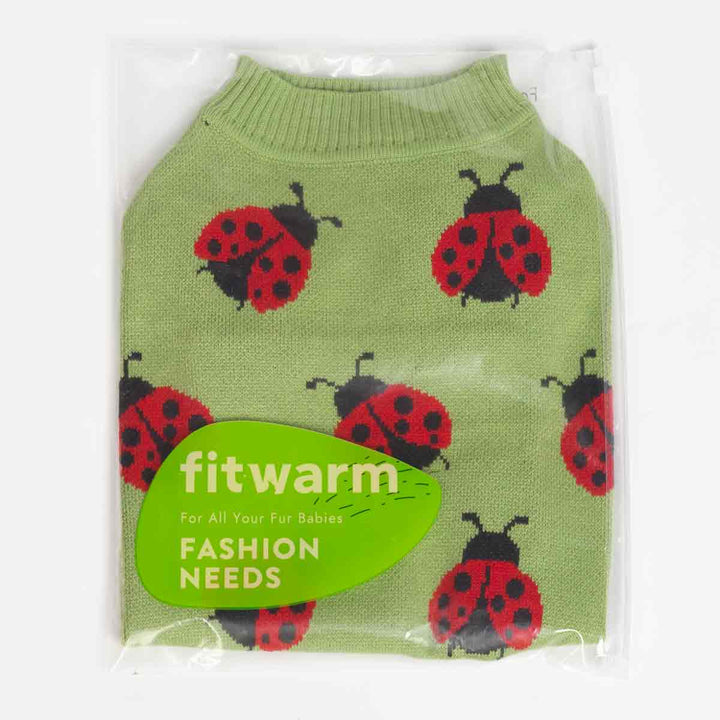Light green dog sweater with ladybug pattern displayed inside clear Fitwarm packaging.