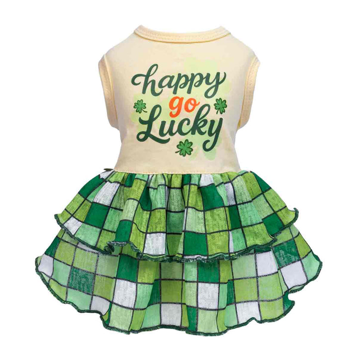 Cream and green dog dress featuring “Happy Go Lucky” lettering and layered plaid ruffle skirt.